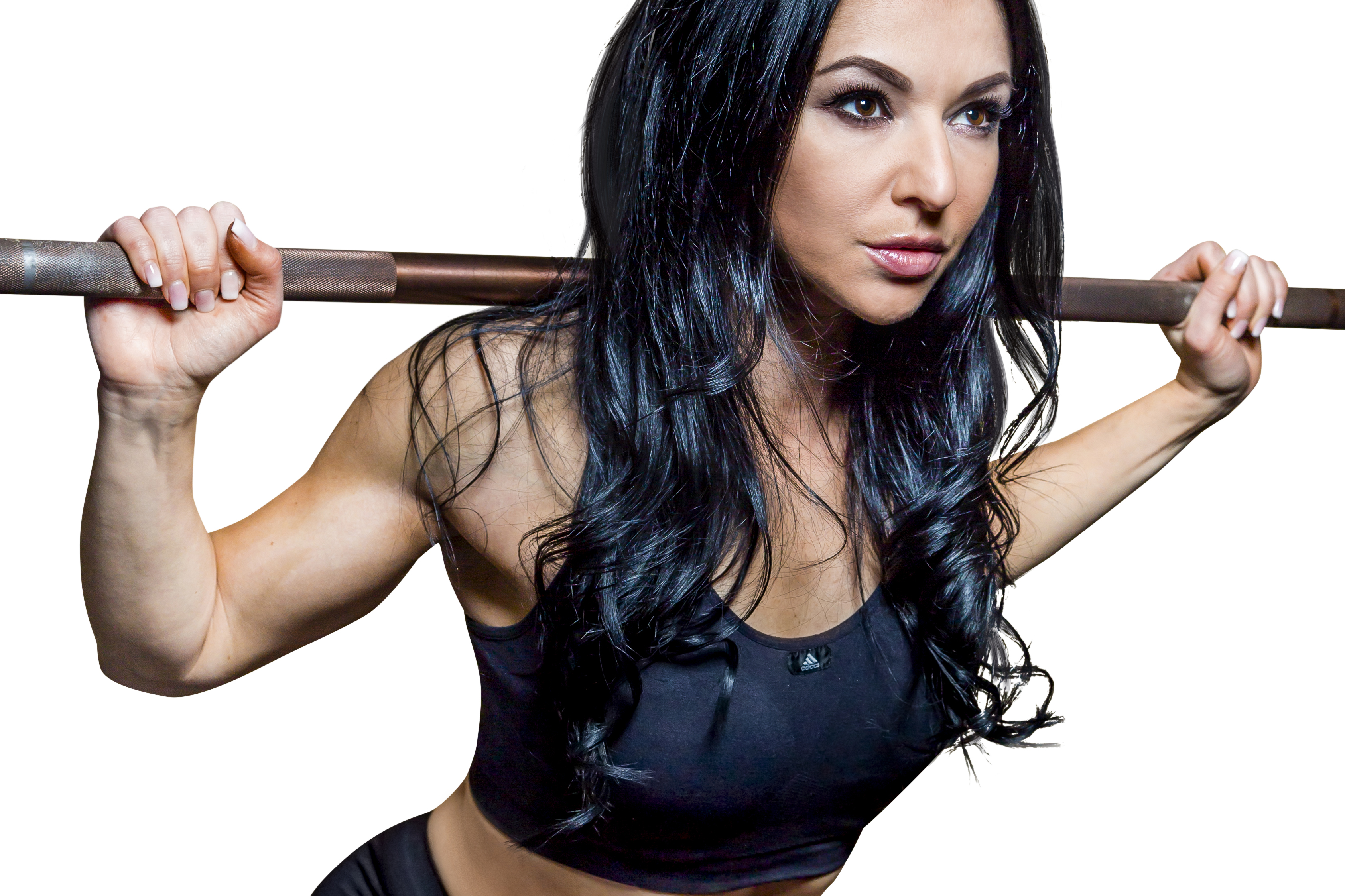 Fitness Model Oxana Hegel beim Kniebeuge im Studio21