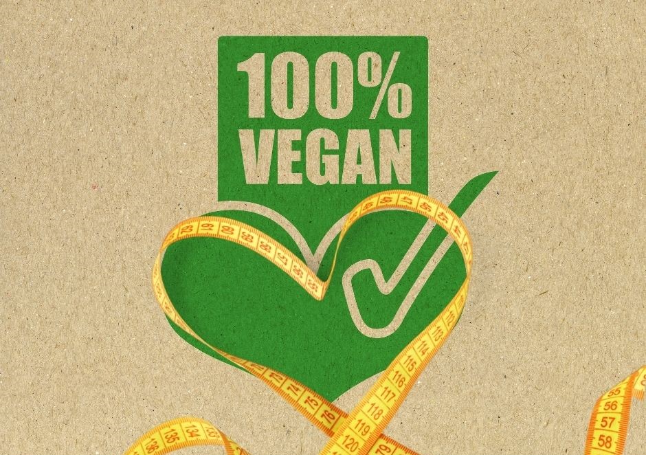 Vegan abnehmen dargestellt von vegan Logo und Maßband
